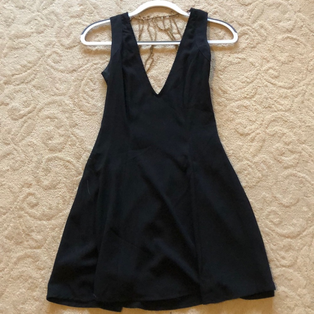 Worn once Tobi black dress. Beautiful back